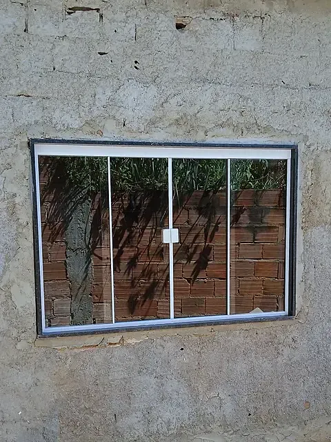 Instalação de janela de correr em vidro temperado